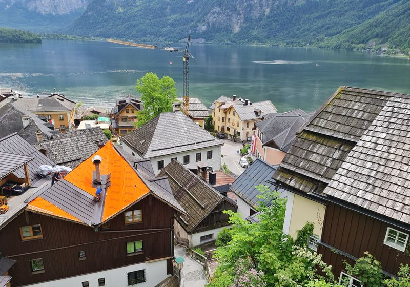 Rooftops of Hallstatt with the lake and mountains behind
