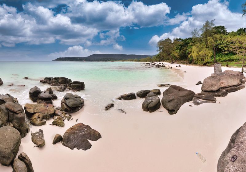White sand and granite boulders on a quiet Koh Rong beach
