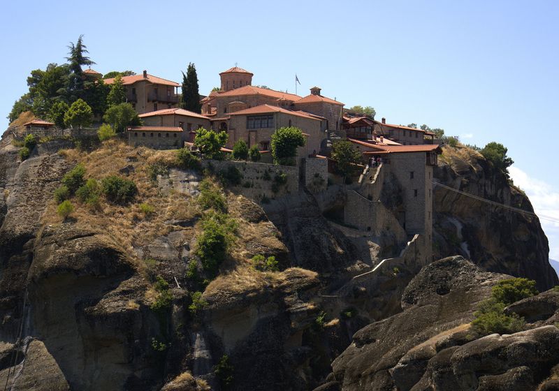 A monastery built on the edge of a rock cliff